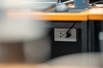 Power Outlet Under Desk in Modern Office