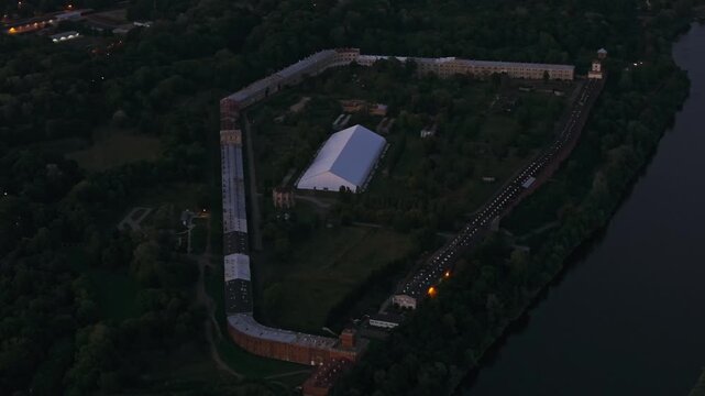 Cinematic night shot Modlin Fortress walls and river location near Warsaw Poland