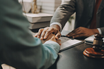 Lawyer explained to the client about the law that must be brought against the court case.