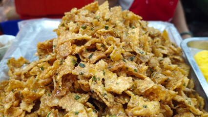 Thai gnocchi. Caramelized crisps. Thai herbal crispy curl.