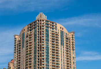 modern apartment building with balconies and laundry drying in Shanghai, China