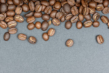 Top view of Roasted coffee beans in dark background