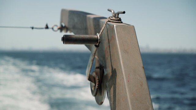 part of a boat or vessel to which a lifeboat is attached - davit