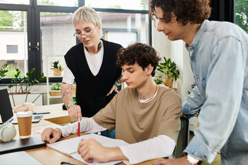 Young professionals collaborate in a modern office space, discussing ideas and project plans