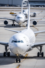 Naklejka premium Cargo airplanes parked at international airport 