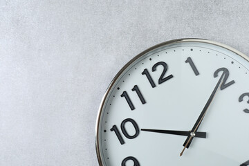 wall clock on a gray background
