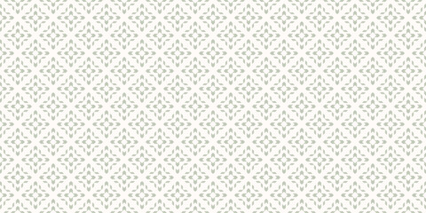 Obraz na płótnie Canvas Subtle vector seamless pattern with ethnic motif. Modern geometric floral folk ornament. Simple abstract green and white background texture with grid, flower silhouettes. Repeated vintage geo design