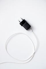 Close-up of mobile phone charger isolated on white background