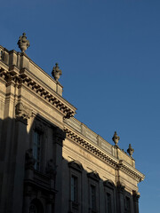 Neoclassical Building Facade with Sculptures in Evening Light, Berlin