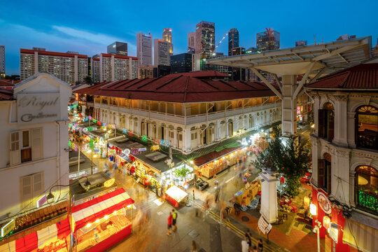 Chinatown in Singapore lights up during the Chinese New Year and Mid-Autumn Festival, creating a beautiful night scene in the city.