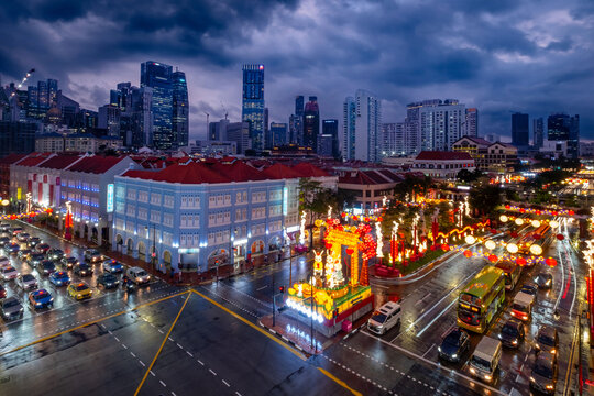 Chinatown in Singapore lights up during the Chinese New Year and Mid-Autumn Festival, creating a beautiful night scene in the city.