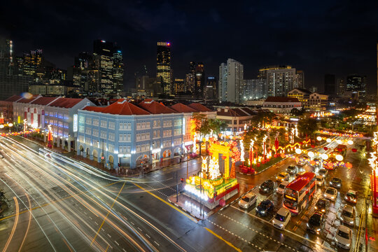 Chinatown in Singapore lights up during the Chinese New Year and Mid-Autumn Festival, creating a beautiful night scene in the city.