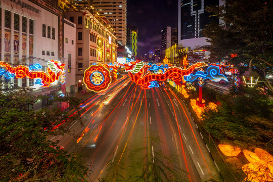 Chinatown in Singapore lights up during the Chinese New Year and Mid-Autumn Festival, creating a beautiful night scene in the city.