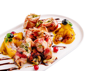 Flavorful gourmet dish served on a white plate with vibrant colors