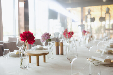 Elegant floral arrangement sets the tone for a serene dining experience in a contemporary restaurant