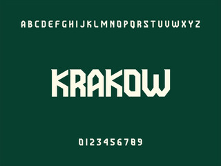 Krakow City Name Display in Modern White Geometric Sans Serif Font with Alphabet and Numbers on Dark Green Background