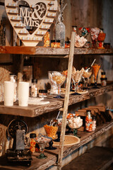 Rustic boho wedding with couple, decorations, flowers and celebration in vintage barn