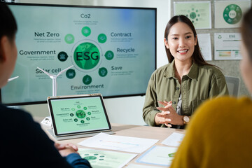Asian business team discussion reusable product in office,start up eco-friendly business,environmental protection,sustainable business model,ESG strategy,eco system,team meeting at office