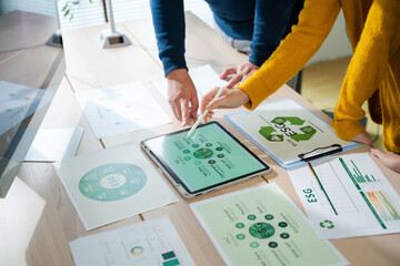 Asian business team discussion reusable product in office,start up eco-friendly business,environmental protection,sustainable business model,ESG strategy,eco system,team meeting at office