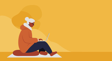 Senior woman focused on working or learning remotely on her laptop in a comfortable, minimalist setting. Depicts digital literacy and an active senior lifestyle.