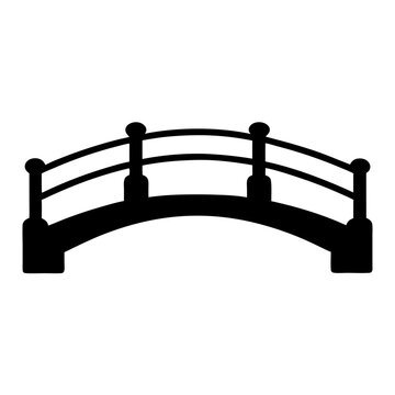 Silhouette image of an arched bridge with railings and spherical decorations