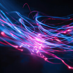 Dynamic motion of neon light trails with blue and pink hues