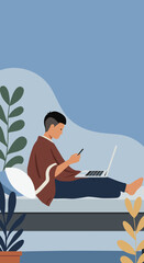 Young person multitasking with a laptop and smartphone in a comfortable home setting, depicting remote work, online communication, or leisure.