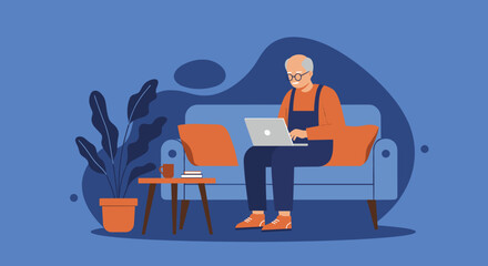Senior man working or learning on a laptop from his comfortable home sofa, reflecting digital inclusion and a connected lifestyle.