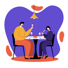 Happy couple enjoying a romantic dinner date, toasting with wine and sharing dessert at a restaurant. Perfect for celebration, anniversary, or lifestyle content.