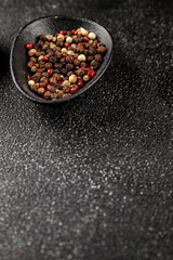 Peppers peas seasoning mix spices types of peas white, black, green, pink spices tasty snack fresh delicious gourmet food background on the table rustic top view copy space