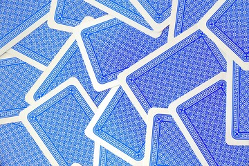 Backside of a large group of playing cards for background