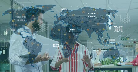 VR specialist woman using floating map appearing in office while colleague observing icons linking - Powered by Adobe