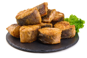 Fried Catfish steaks, isolated on white background.