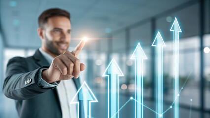 Businessman pointing at glowing growth arrows in office showing optimistic success and upward trend