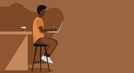 African American man working on laptop with stylus at a bar counter in a modern cafe. Ideal for remote work, business, technology, or lifestyle concepts.