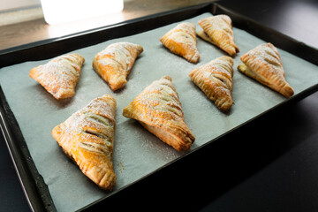 Puff pastry triangles with jam. Dessert. Pastry. Dough