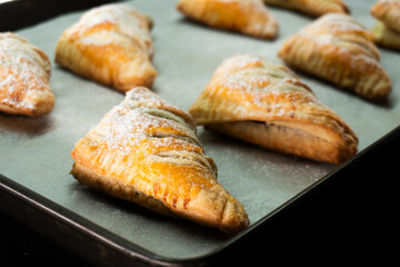 Puff pastry triangles with jam. Dessert. Pastry. Dough