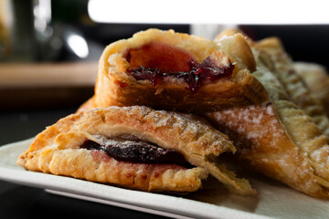 Puff pastry triangles with jam. Dessert. Pastry. Dough