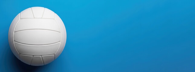 White volleyball resting on a vibrant blue background, showcasing its textured surface and stitching details, ideal for sports-themed designs and promotional materials