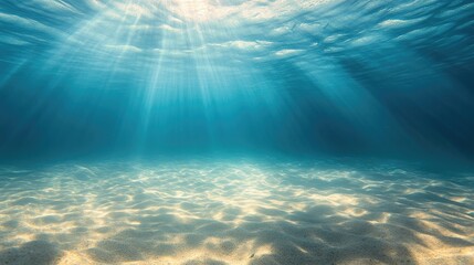Fototapeta premium Sunlight beams through turquoise water, illuminating sandy seabed (1)