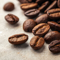 Naklejka premium Roasted coffee beans in air brown coffee beans aromatic coffee beans closeup co