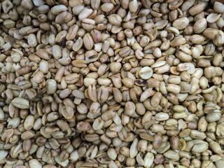 Display of snacks and treats in a supermarket, onion peanuts or kacang bawang.