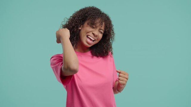 African Teen Girl Makes Victory Gesture Yes, Clenched Fist, Joy Triumphant Lady