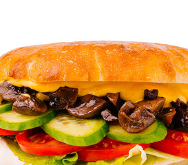 Delicious sandwich with mushrooms, cheese, and fresh vegetables on crusty bread