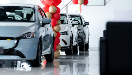 Car parked in luxury showroom. Car dealership office. Car showroom business. New car parked in modern showroom. Auto for sale and rent business. Automobile leasing and insurance. Electric automobile.