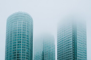 Obraz premium Misty City Skyline With Modern High-Rise Buildings