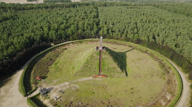 Aerial approach Pyramide Austerlitz, old historical landmark in the middle of natural area Utrechtse Heuvelrug, monument dedicated to Napoleon Bonaparte