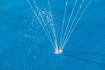 Detailaufnahme Wasserfontäne aus dem Boden