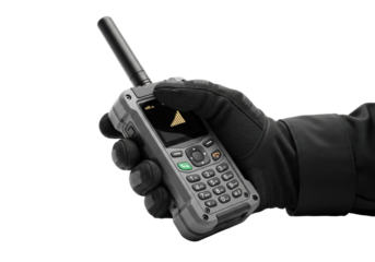 Rugged black work glove gripping industrial satellite phone with amber screen, on transparent studio background with negative space for robust communication technology concept