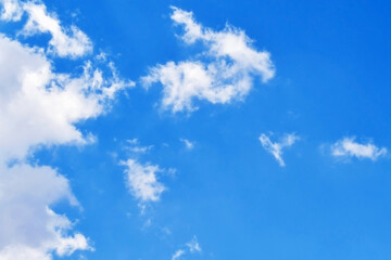 Blue sky with white fluffy cloud. Cumulus clouds background. Cloudscape morning sky. The concepts of freedom of life, never give up and positive though energy.